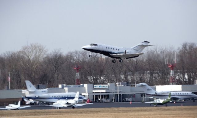 Hawker 800 (N417TM) - On departure is this 2004 Raytheon Hawker 800XP in the Winter of 2019.