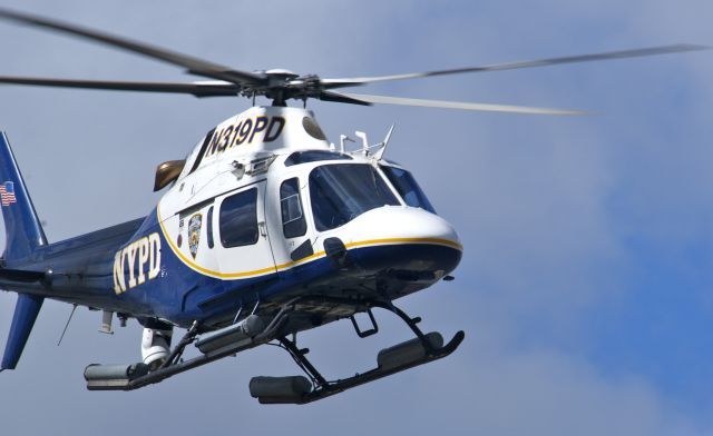 — — - Standing on the banks of the Hudson River.  Prior to the Shuttle Enterprise arrival in NYC on the final mission enroute to its new home on the Intrepid aircraft carrier, the NYPD was checking things out.