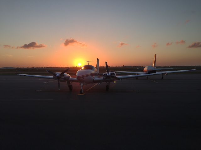 Beechcraft 55 Baron (N325SR) - Sunset at Harlingen Sun Valley FBO.