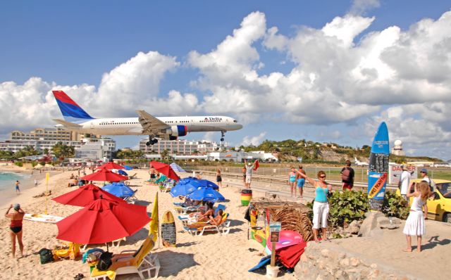 Boeing 757-200 (N604DL) - Typical fun filled day on the ultimate spotters beach...MAHO