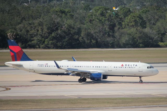 Airbus A321 (N108DN) - Delta Flight 1182 taxis to gate at Tampa International Airport following flight from Minneapolis-St Paul International Airport