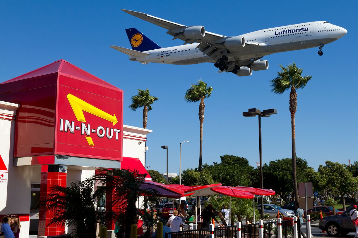 BOEING 747-8 (D-ABYD) - I’ve been taking picture at this location for the past 12 years now, and over that time those palm trees have grown and grown.  Having said that… timing is now critical to get the entire AC in the shot.  I made 4 other attempts before finally getting a perfectly framed shot like this one.