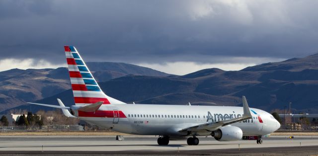 Boeing 737-800 (N832NN) - As a new day begins under dark clouds, AAs N832NN taxies on to runway 34L to depart for a flight to ORD.