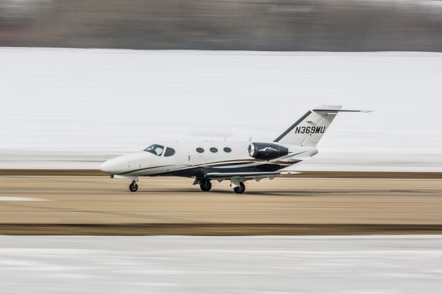 Cessna Citation Mustang (N369MU) - Cessna Citation Mustang departing runway 25 for CYBW.