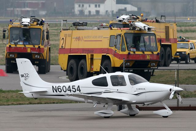 Cirrus SR-22 (N60454) - Firetrucks returning after exercise at the other side of the airport.