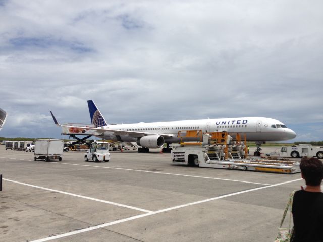 BOEING 757-300 (N57855) - At the gate to Newark on August 26, 2013 at Punta Cana International Airport.