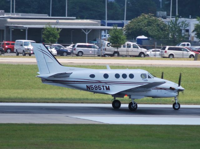 Beechcraft King Air 90 (N595TM) - M & M AERO GROUP LLC / Rolling 18C - 7/15/10