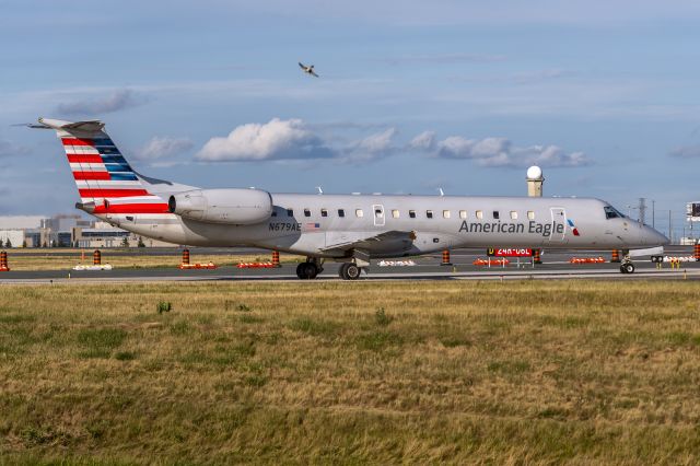 Embraer ERJ-145 (N679AE) - 18th July, 2022: American Eagle operated by Envoy holding short of runway 06R at Toronto's Pearson Airport. 