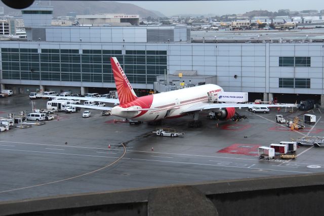 BOEING 777-200LR (VT-ALF) - KSFO - Air India at the International Terminal G being serviced by the ground crews.