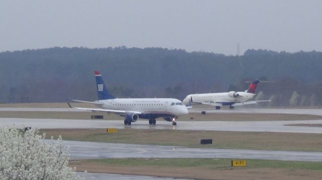 Embraer ERJ 175 (N124HQ) - U.S. Airways (Republic) 4619 departing to Reagan National at 3:40 P.M.  Taken March 19, 2015.