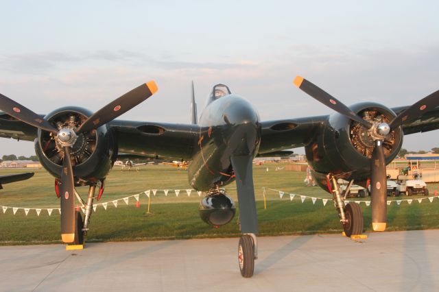 — — - F7-F Tigercat in the Evening Light at EAA 2011