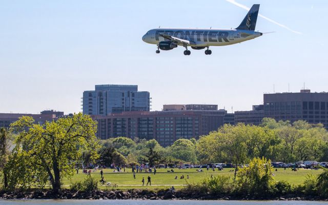 Airbus A320 (N209FR) - Frontier Airlines A320 over Gravelly Park on the north end of DCA.