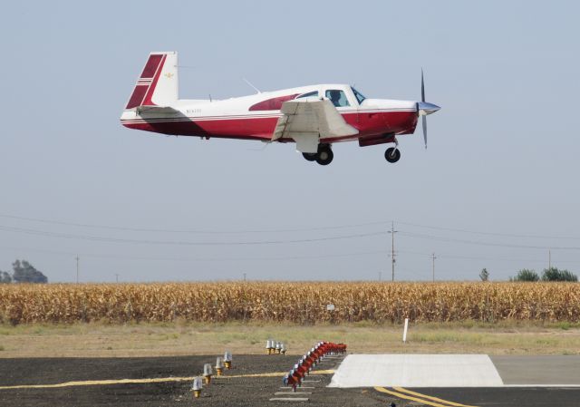 Mooney M-20 (N74751) - Mike Landing his 1961 MOONEY M20B, runway three-zero at Merced Regional Airport
