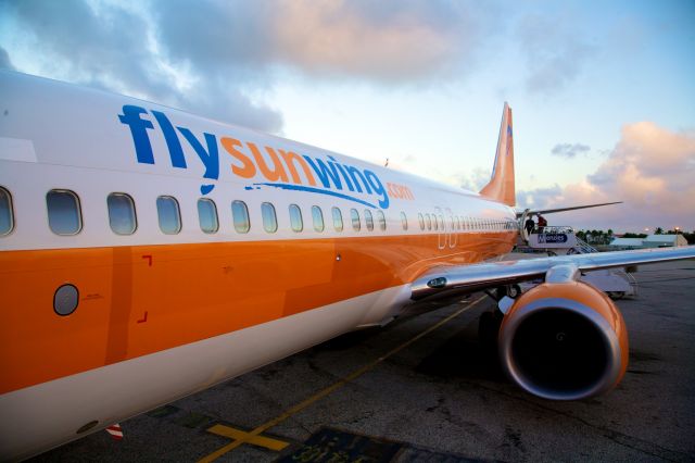 Boeing 737-800 (C-FTLK) - Passengers board SWG 765 ready for departure from Sint Maarten - Jan 6, 2013