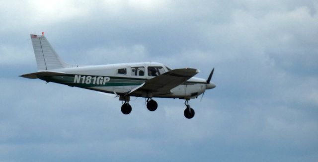 Piper Cherokee (N181GP) - Making a low pass is this 1984 Piper Cherokee Archer II in the Spring of 2025.