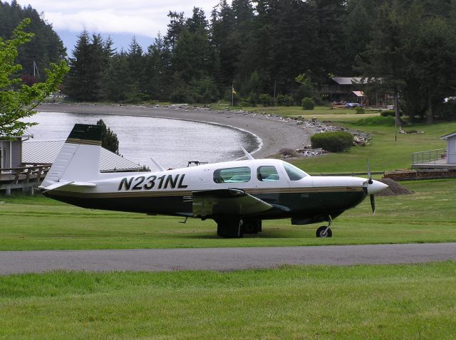 Mooney M-20 Turbo (N231NL) - Free wash job courtesy the Northwest rain in the back yard