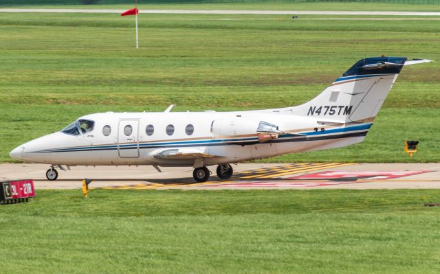 Beechcraft Beechjet (N475TM) - Trailblazer 475 taxiing to the FBO at Lunken Airport, after a flight from Naples, FL.