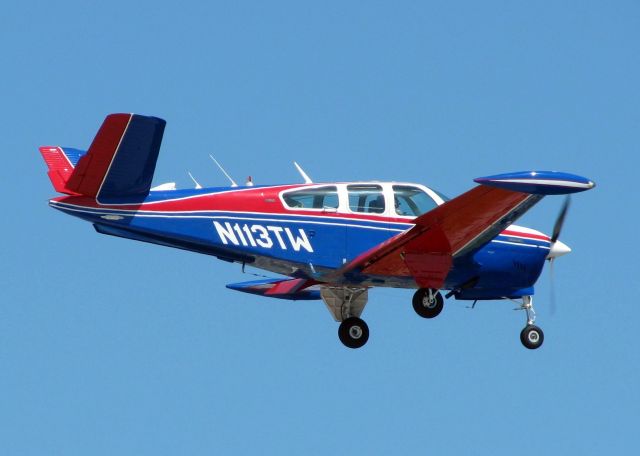 Beechcraft 35 Bonanza (N113TW) - 1973 Beech V35B landing at Shreveport's Downtown Airport. A beautiful V-Tail!