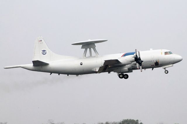 Lockheed P-3 Orion (N146CS) - Apr2019- departing under a special mission .....foggy day, air side shot