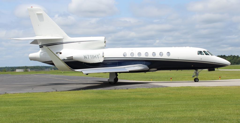 Dassault Falcon 50 (N711HT) - A 1982 model Dassault-Breguet Falcon 50 taxiing at Tuscaloosa National Airport, AL - June 25, 2021.