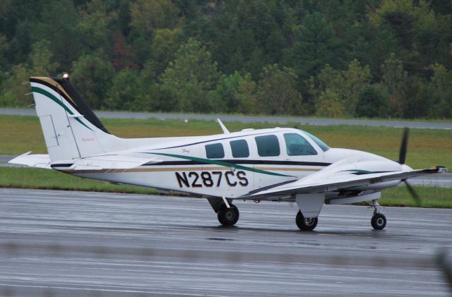 Beechcraft Baron (58) (N287CS) - JVG LEASING INC taxiing at KJQF - 9/22/11