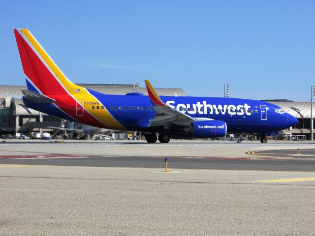 Boeing 737-700 (N559WN) - Line up and wait on RWY 20R