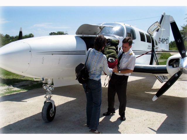 Cessna 402 (ZS-MPC) - At the Vumbura airstrip, Botswana.