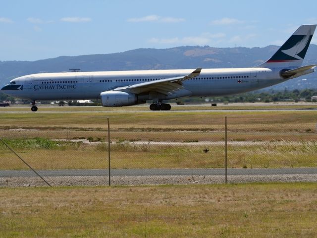 Airbus A330-300 (B-HLQ) - On to taxi-way heading for Terminal 1, after arrival from Hong Kong. Wednesday 4th January 2012.