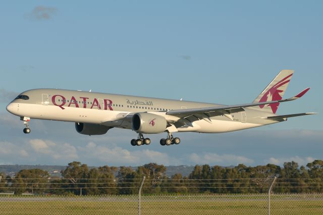 Airbus A350-900 (A7-ALI) - July 10, 2016 alongside runway 05 in mid winter light.