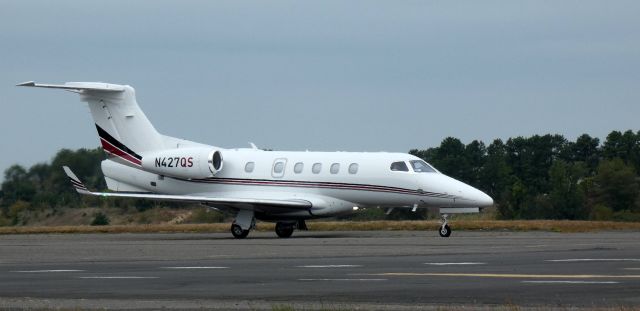Embraer Phenom 300 (N427QS) - Taxiing for departure is this 2018 Embraer Phenom 300 from the Summer of 2024.