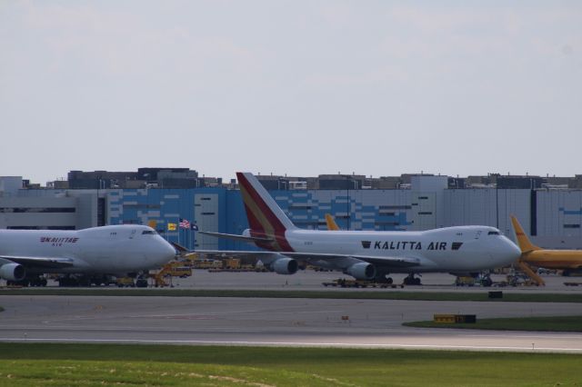 Boeing 747-400 (N712CK) - A Tail of two Tails.