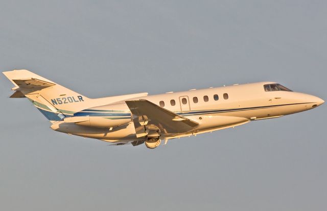 Hawker 800 (N520LR) - New paint job close up and climbing off RWY22R