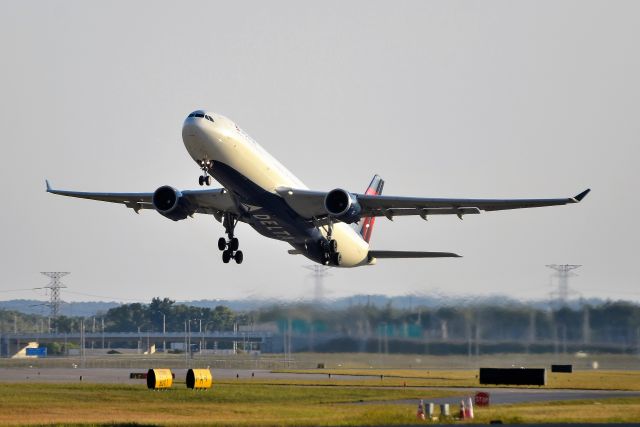 Airbus A330-300 (N823NW) - Departing 5-L during golden hour carrying the Minnesota Vikings football team after their loss to our Indianapolis Colt's! Taken 09-20-20