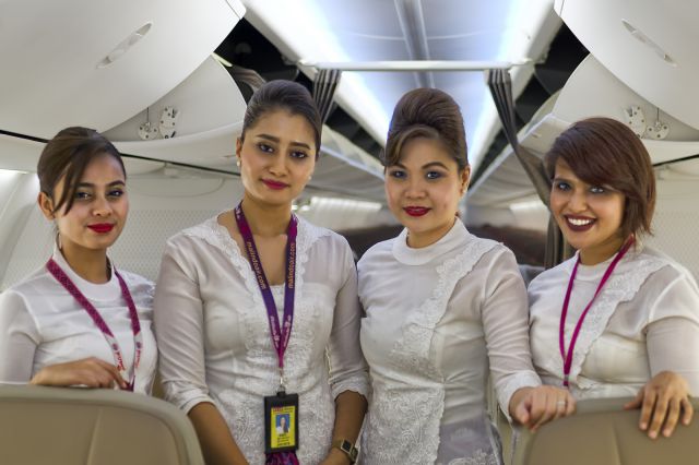 Boeing 737-800 (9M-LCK) - MALINDO AIR, 18th March., 2017: Cabin Crew Nur (second from left) and her colleagues pose for a photograph in the Business Class Cabin of their Boeing 737-800. The airline operates three daily flights between KLIA and Dhaka.