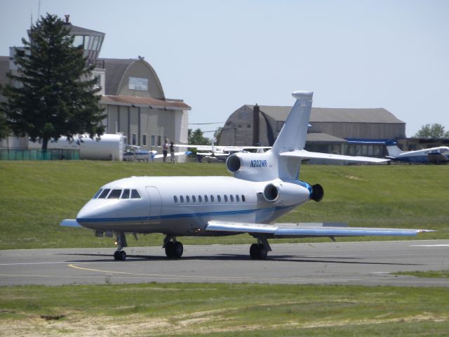 Dassault Falcon 900 (N202WR) - N202WR landing at KBLM. This tail number is blocked, so it was pure luck getting to see it.