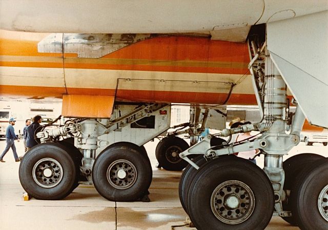 Boeing 747-200 (N611BN) - Main landing gear of a Braniff B-747 that was on display at an air show at the old Navy Dallas Naval Air Station