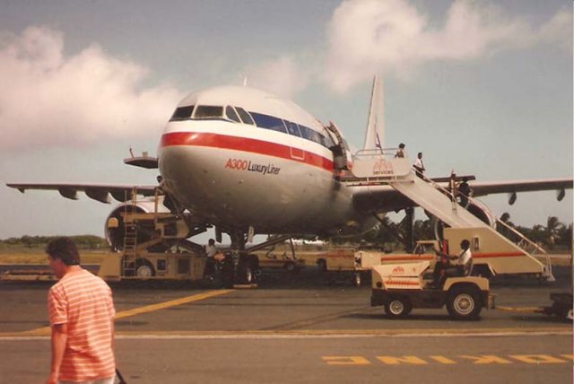 — — - A300-600 of American Airlines about to board passengers for a short St. Maarten to San Juan flight.