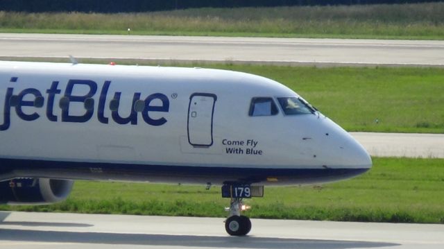 Embraer ERJ-190 (N179JB) - jetBlue 1126 departing to Ft. Lauderdale at 5:24P.M.  Aircraft name is "Come Fly With Blue"  Taken June 7, 2015.  