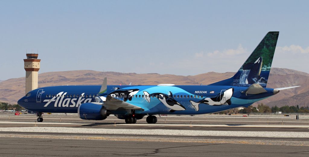 Boeing 737 MAX 9 (N932AK) - ASA's "West Coast Wonders" special livery fleetbird (N932AK) with Killer Whales (Orcas) splashing around taxies north on Alpha after arriving from Seattle. This is the first time that the "West Coast Wonders" scheme has been seen at RNO.