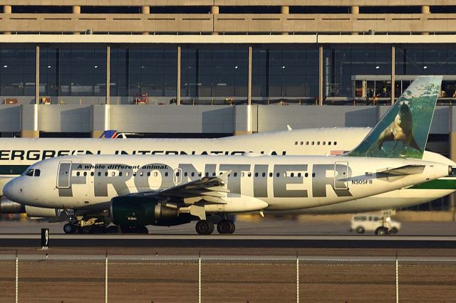 Airbus A319 (N905FR) - A319-111 N905FR departing for Denver International. A319-132 N822AW Nevada departing for Sacramento International.