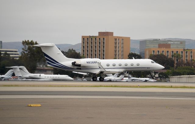 Gulfstream Aerospace Gulfstream IV (N826RP) - This Gulfstream is just starting its rotation on 20R. The photo was snapped from the parking lot at the museum.