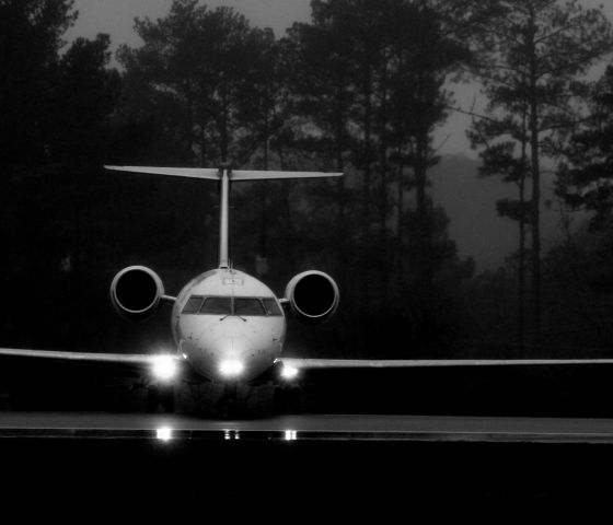 Canadair Regional Jet CRJ-200 (N882AS) - Rainy-day at Fayetteville. 