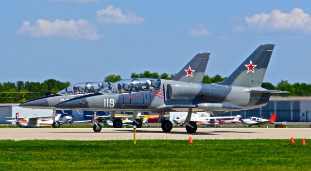 Aero L-39 Albatros (N139TB) - Two L-39s departing at EAA AirVenture 2015!