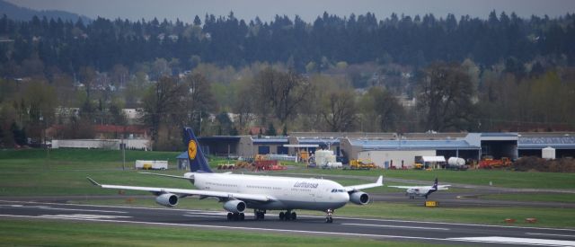 Airbus A340-300 (D-AIFD) - Lufthansa Airbus A340-300 Taking off from 28L at Portland International Airport.