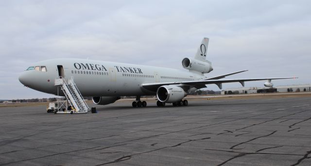 McDonnell Douglas DC-10 (N974VV) - Omega Tankers McDonnell Douglas DC-10-40 on the ramp under overcast skies at Carl T. Jones Field, Huntsville International Airport, AL - December 19, 2016. Shot from inside the passenger side of a vehicle moving at a walking pace around the aircraft.