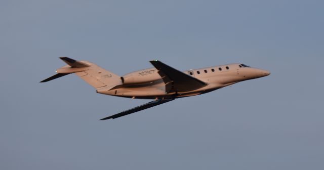 Cessna Citation X (N726XJ) - A Cessna Citation X C750 departs Monmouth Airport, NJ for a cross country flight Dec. 2020.