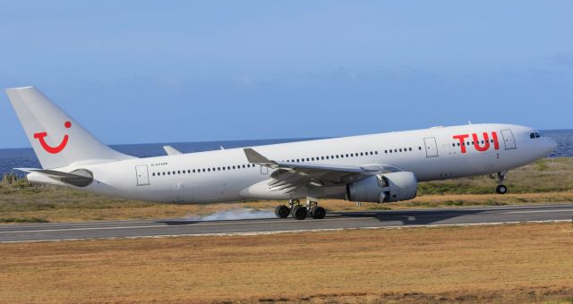 Airbus A330-200 (G-VYGM) - Tui airlines landing at TNCC all white style!