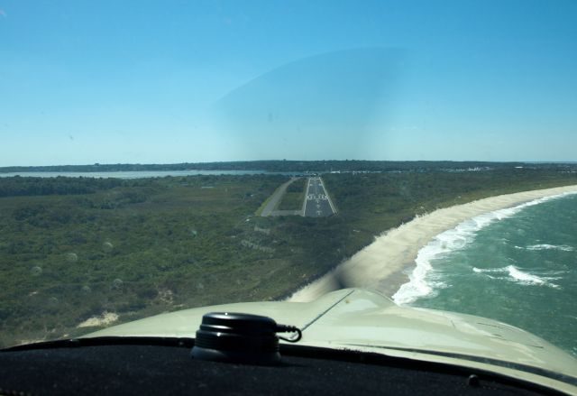 Grumman AA-5 Tiger (N28218) - Landing RW28. Be alert for possible windshear over the dunes.