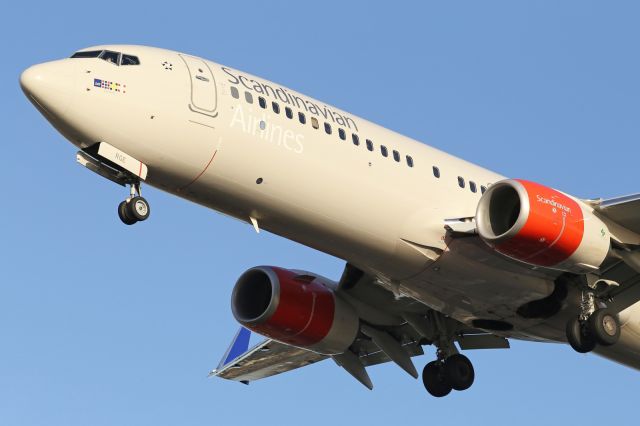 Boeing 737-800 — - Landing runway 027L at LHR.