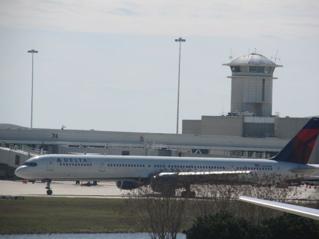 BOEING 757-300 (N589NW) - From gate 128 in KMCO terminal